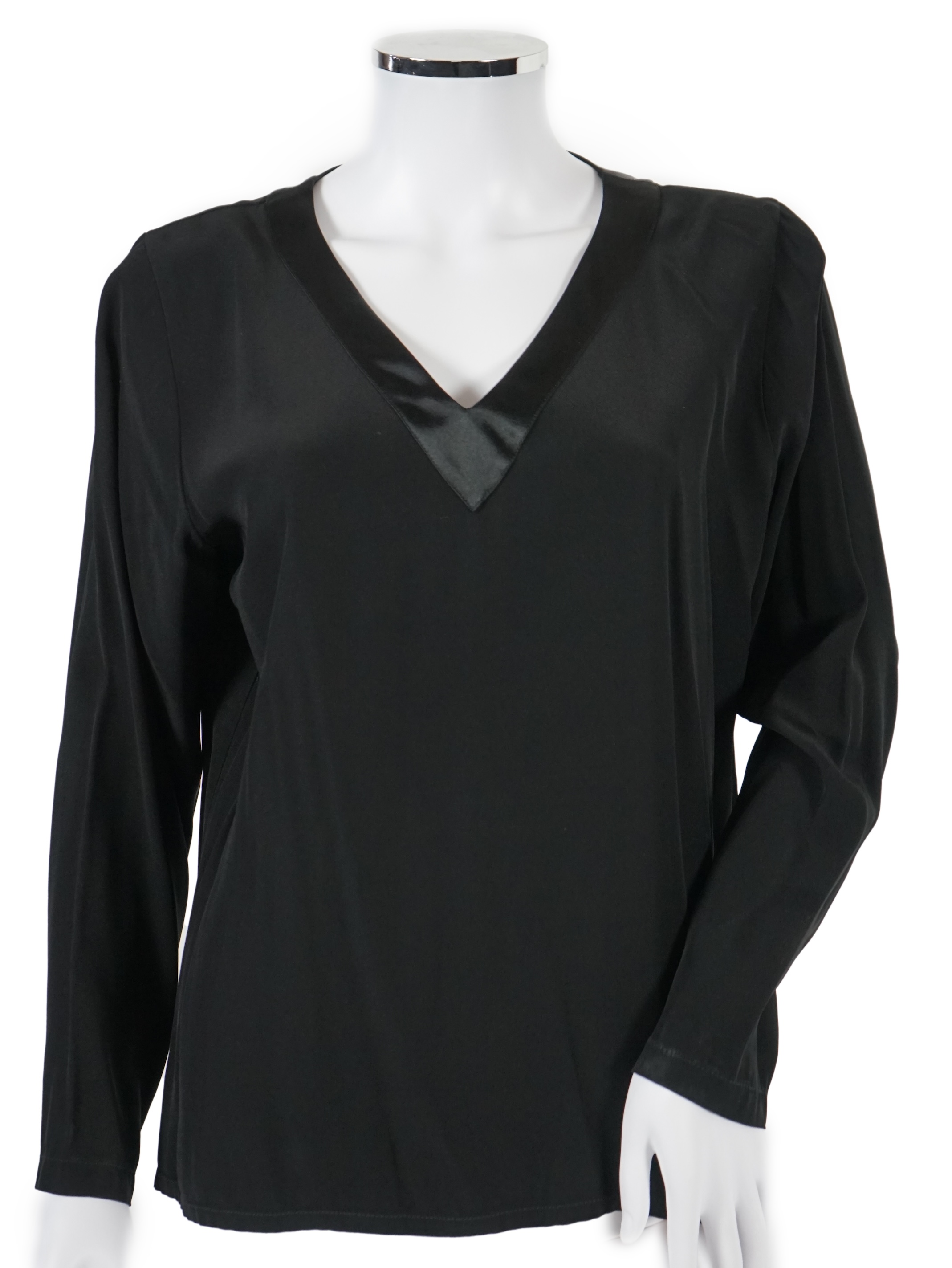 Four vintage Yves Saint Laurent variation lady's tops, F 40 (UK 12).Proceeds to Happy Paws Puppy Rescue
